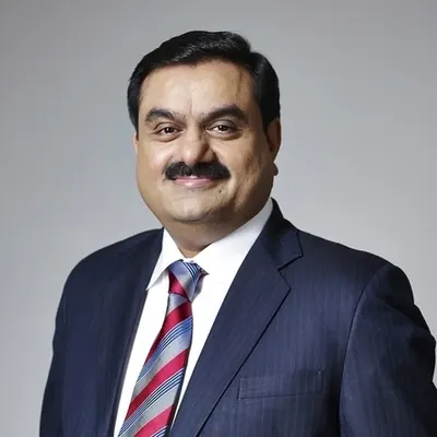 Gautam Adani portrait — WovexiCore endorsement